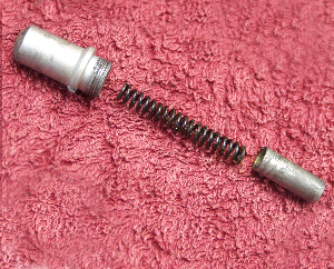 The slow motion spring pusher components