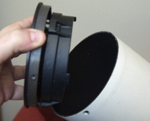 The rear plate and mirror cell being removed from the tube