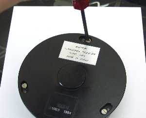 Removing the mirror cell from the rear plate