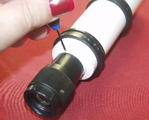 tighetning down the optical assembly grub screw